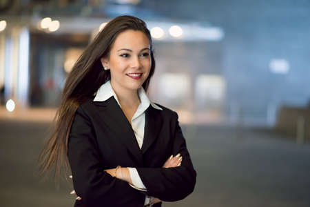 Business woman smiling, nightの写真素材