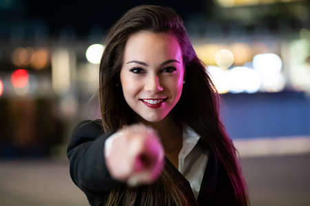 Young manager pointing his finger to you, recruitment conceptの写真素材