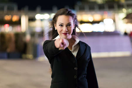 Young manager pointing his finger to you, recruitment conceptの写真素材