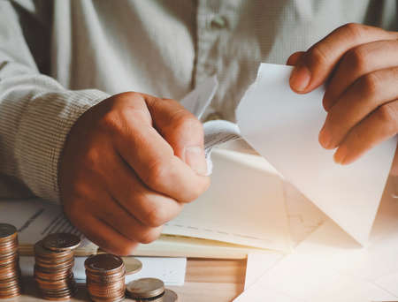 Businessman Torn white paper. tearing contract.の写真素材