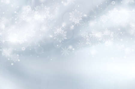 Gray abstract background. white light and snowflakes bokeh winter for Christmas new year blurred beautiful shiny lights use for card banner wallpaper backdrop and your product.の写真素材