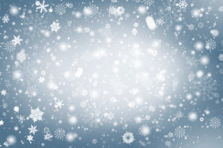 Blue abstract background. white light and snowflakes bokeh winter for Christmas new year blurred beautiful shiny lights use for card banner wallpaper backdrop and your product.の写真素材