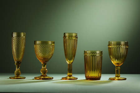 Decorative plate with golden cactus, elephant, unicorn, flamingo, mermaid on beige backgroundの写真素材