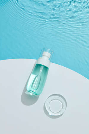 Abstract geometric black podium. Cosmetic square stand in black background cosmesticsの写真素材