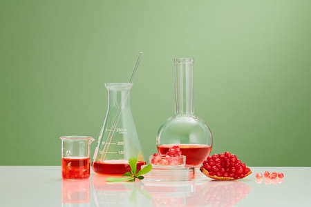 Dark blue background with gift box full of christmas ornament , candy yellow ribbon colorful twinkle pearl , christmas holiday contentの写真素材