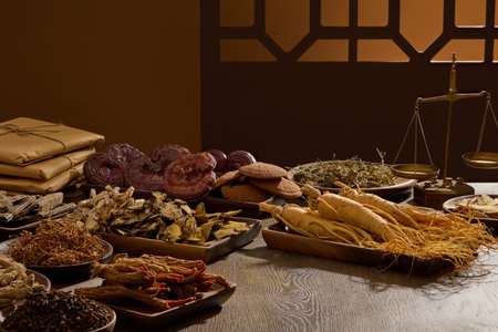 On the wooden table, different type of medicinal herbs displayed on wooden trays. Scene for medicine advertising, photography traditional medicine content. Blank space for presentation productの写真素材