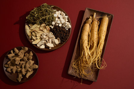 A dish featured Dried mint, Bai zhu, Sand ginger, Cloves and Poria cocos arranged with Ginger roots and Dried turmeric. Healthy medicine concept for all agesの写真素材