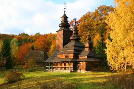 Ancient rural church in the autumn landscapeの写真素材