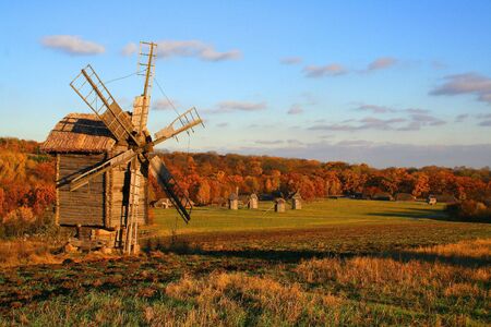 windmill on the meadow - Autumn Landscape, beautiful vivid natureの写真素材