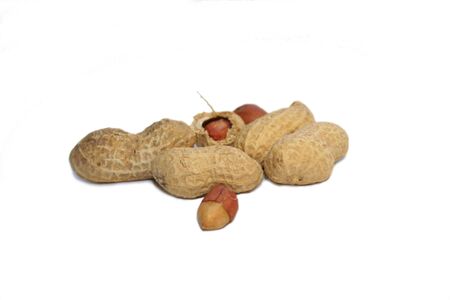 Peanuts over the white background. Still life