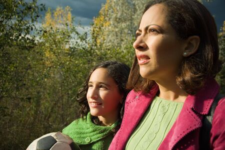 The last bursts of sun light before the big storm in the backround.の写真素材