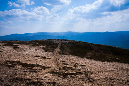 People strolling on the top of the Polish mountainsの写真素材