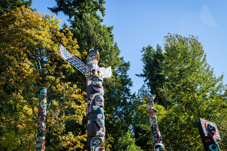 Photo of the colourful totems on a sunny day.の写真素材