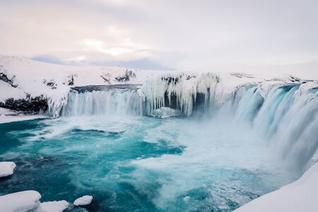 Photo of the Godafoss waterfall in winter Icelandの写真素材