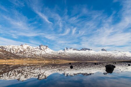 Icelandic mountains with the amazing lagoon in winter
