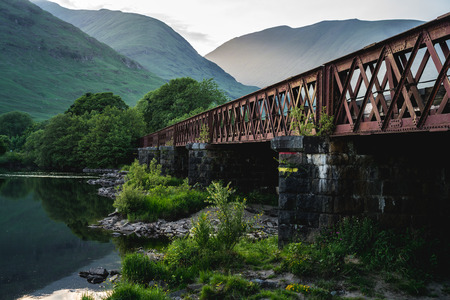 Old metal bridge among scottish scenery, Scotland, UK.の写真素材