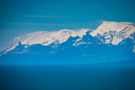 The mountains rise above the blue gulf. Shevelev.の写真素材