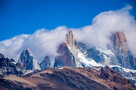The tops of the rocky mountains are immersed in clouds. Shevelev.の写真素材
