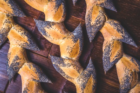 Baking from wheat flour is decorated with poppy seeds.