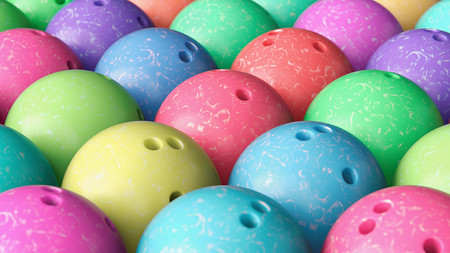 Close up on Array of Tightly Packed, Colorful Bowling Ballsの写真素材