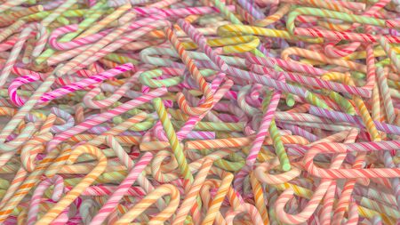 A mesy pile of colorful candy canes. This image is a 3D illustration.の写真素材