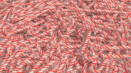 Messy pile of red and white candy canes. This image is a 3D illustration.の写真素材
