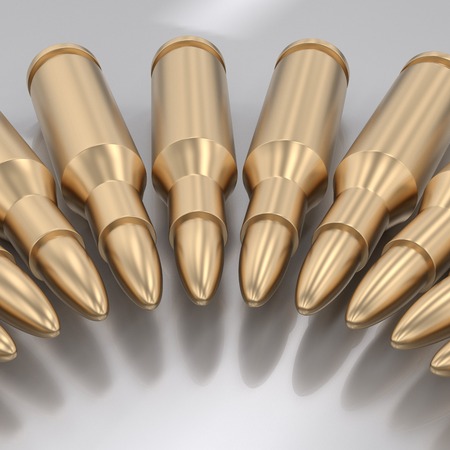 Curving array of gold rifle bullets on a reflective surface. This image is a 3d rendering.の写真素材