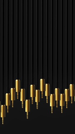 Neat line of gold plated 3.5mm audio jack against a simple black background. This image is a 3d rendering.の写真素材