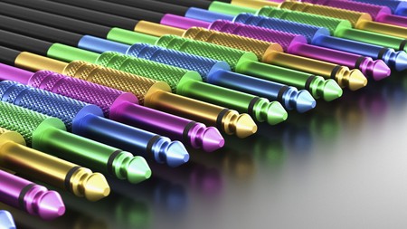 Macro shot of a neat parallel arrangement of colourfully plated 6mm audio jacks on a reflective surface. This image is a 3d rendering.の写真素材