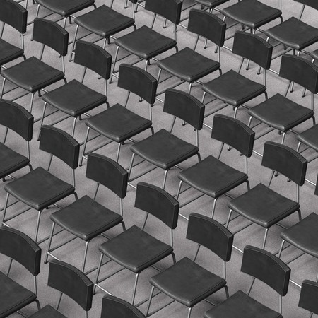 Perfectly aligned rows of black leather and steel chairs on conference room carpet. This image is a 3d render.の写真素材