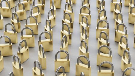 Upright closed clean padlocks variously rotated atop a neat concrete surface. This image is a 3d rendering.の写真素材