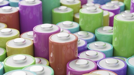 Tightly packed array of colorful double a batteries. This image is a 3d render.