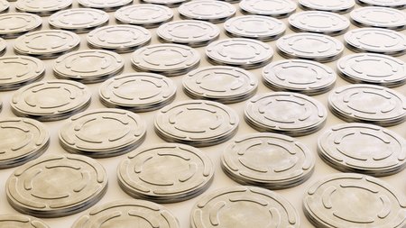 Tightly packed, uniform grid of steel film reel cans under even studio lighting. This image is a 3d renderingの写真素材