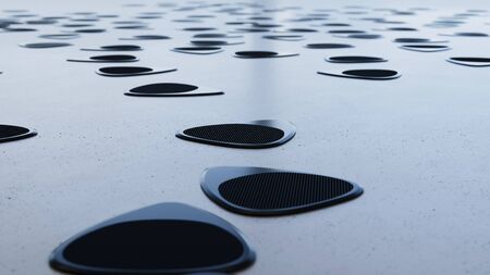 Large scattered array of Guitar Picks arranged on a minimally textured white concrete surface. This...