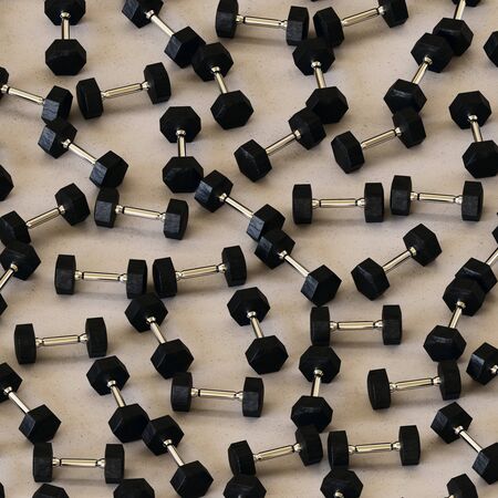 Perfect grid of black dumbells presented with even studio lighting and smooth depth of field. This...