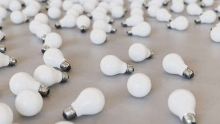 Large scattered array of lightbulbs arranged on a minimally textured white concrete surface. This...
