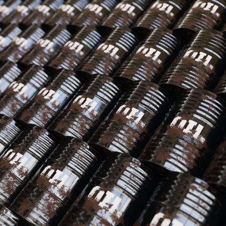 Isolated infinite array of densely packed oil barrels presented with a shallow depth of field. This image is a 3d illustration.の写真素材