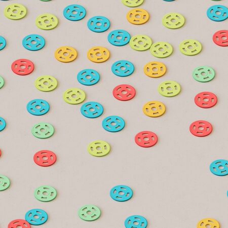 Playfully scattered gears of various chromes on a clean white concrete studio floor. This image is a 3d illustration.の写真素材