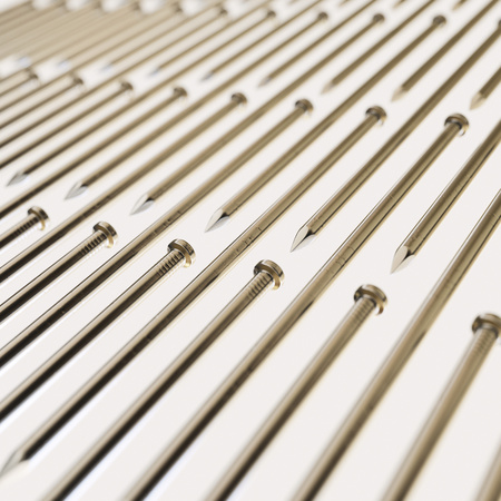 Isolated infinite array of densely packed nails presented with a shallow depth of field. This image is a 3d illustration.の写真素材