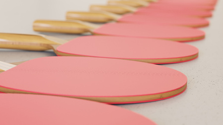 Close up on a tightly packed, perfectly aligned linear array of variously colored  paddles on a...