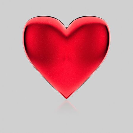 3d rendered Red Love heart on a seamless reflective white surface for easy compositing.の写真素材