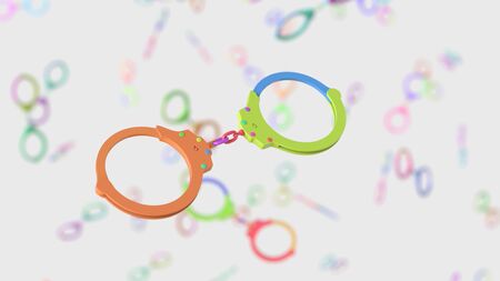Variously Colored Handcuffss Floating in an Empty Spaceの写真素材