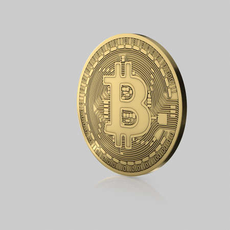 Isolated Gold Bitcoin on an Unmarked Light Background With Reflectionの写真素材
