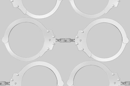 Seamlessly Tiling Background of chrome Handcuffssの写真素材
