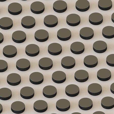 Isometric black Hockey Pucks in a Tight Grid on a Simple Concrete Surfaceの写真素材