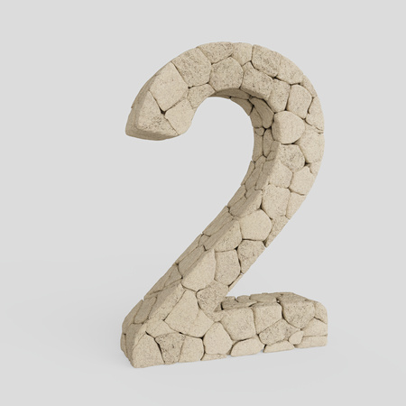 Number 2 made from lightly colored rocks and presented on an infinite white surface with very subtle...