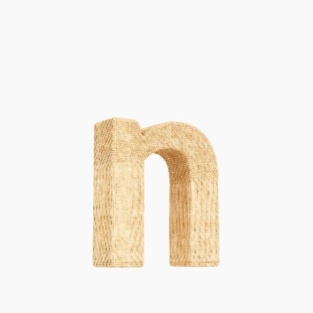 Woven wicker lower case letter n 3d render on a pure white background.の写真素材