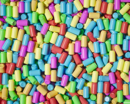 Wall of deeply layered brightly colored plastic drink cans under bright studio lighting. This image is a 3d render.の写真素材