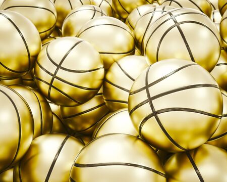 Close up on large pile of gold basketballs with black classy binding under brightly lighting. This image is a 3d render.の写真素材