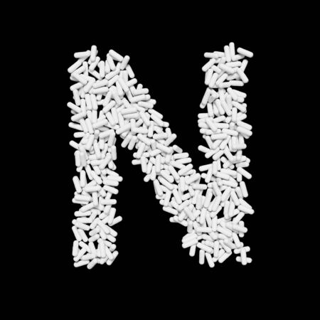 Medical  floating white capsule pills typeface forming the letter N. 3d rendered on a black background.の写真素材